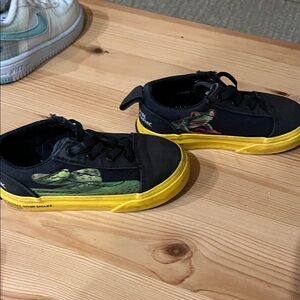 Vans Kids Black and Yellow Sneakers with Graphic